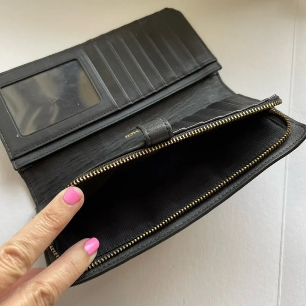 COACH Black leather skinny wallet